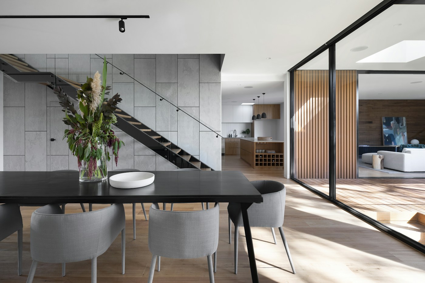 Contemporary living room with geometric wallpaper